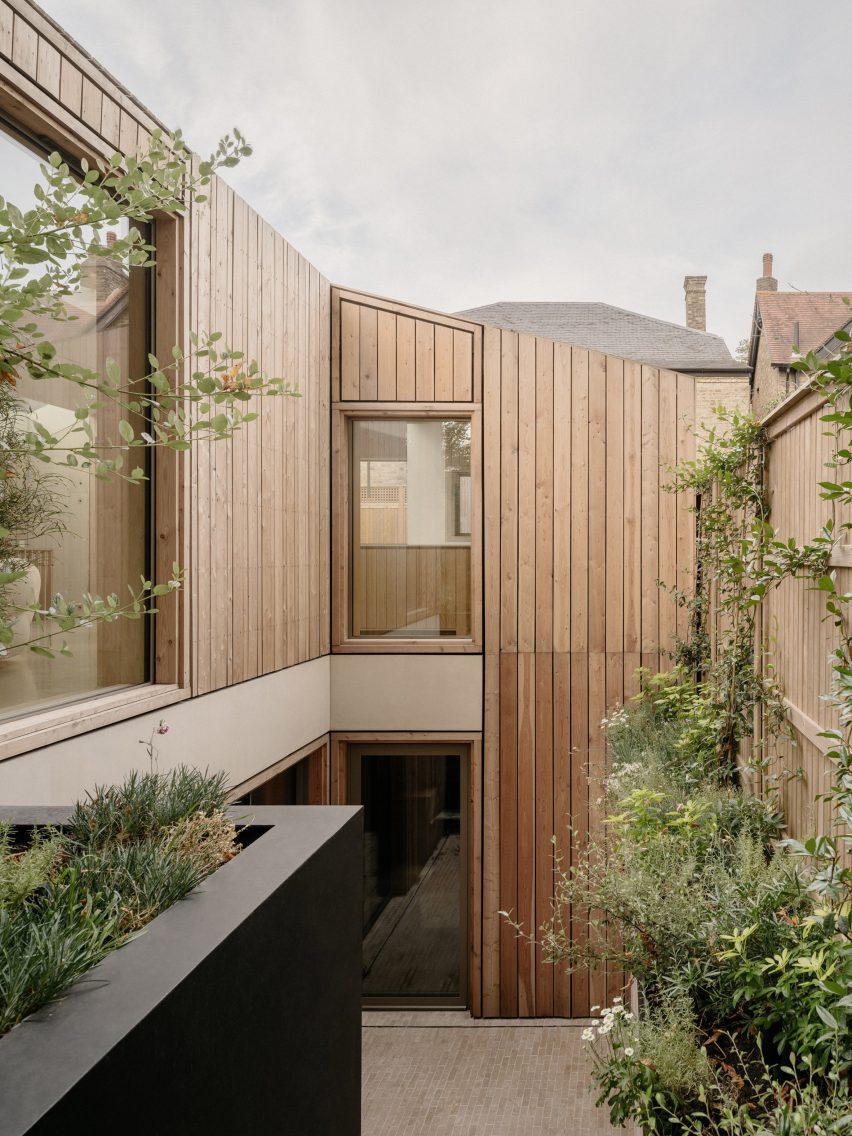 Timber-clad facade overlooking a planted lightwell