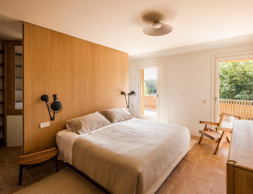 Master bedroom with timber joinery and access to an outdoor terrace