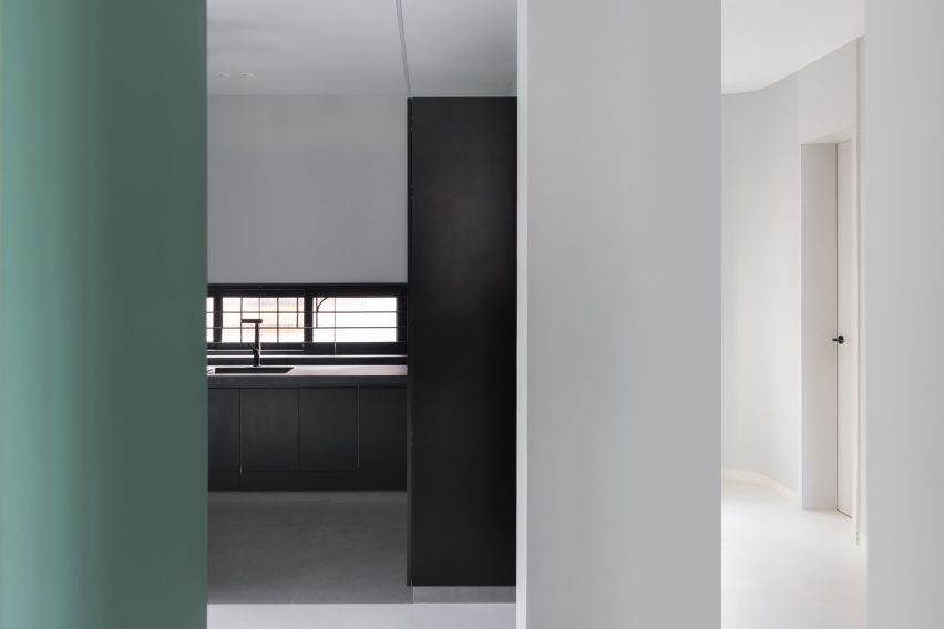 The monotone kitchen contrasts the rest of house in Villa Corsica