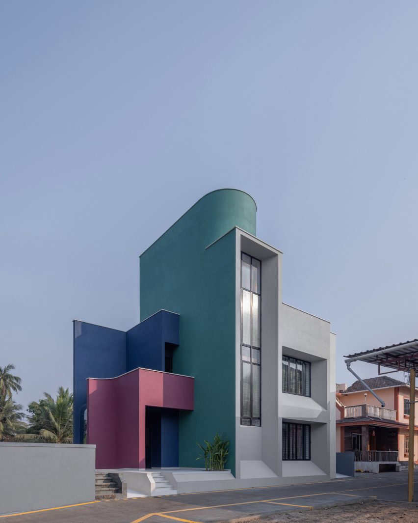 Minimal windows on this sculptural home to reduces heat gain