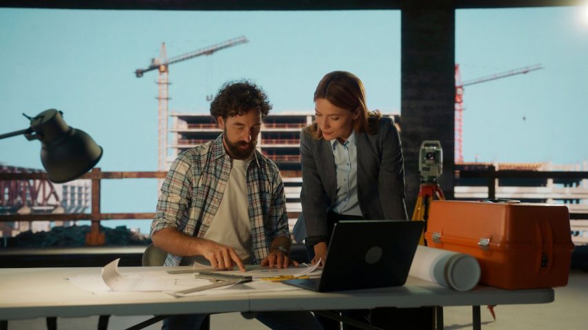 Photo of people planning architecture projects