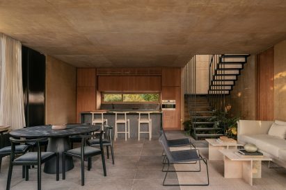 Interior of Argentina house with plants under the stairwell