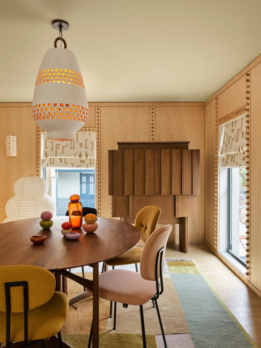 colourful carpet in dining room in Cinderella House by YSG Studio in Redfern Sydney