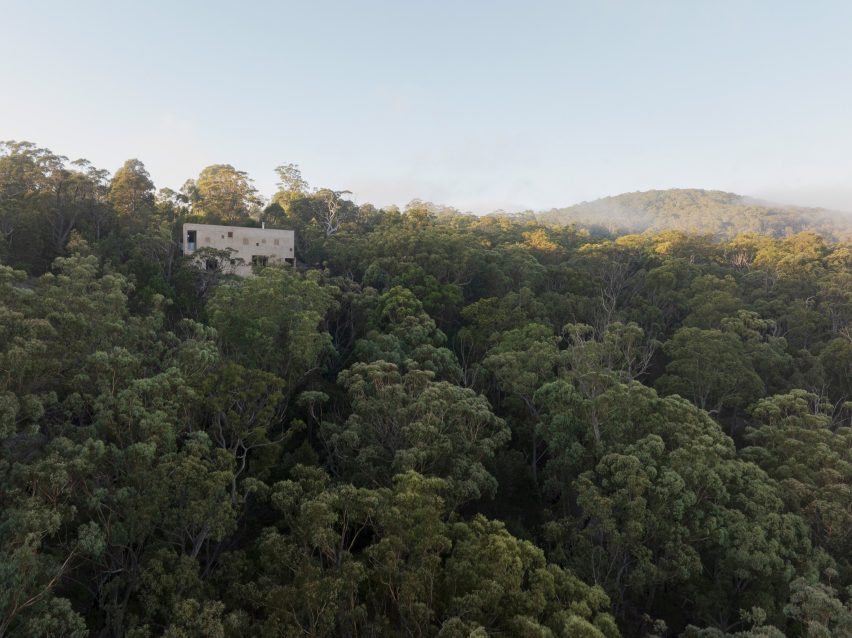 EA House by Bokey Grant on top of rocky cliff face