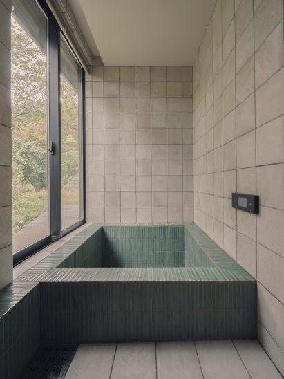 Bathroom interior at Green Sandwich House by HYAN