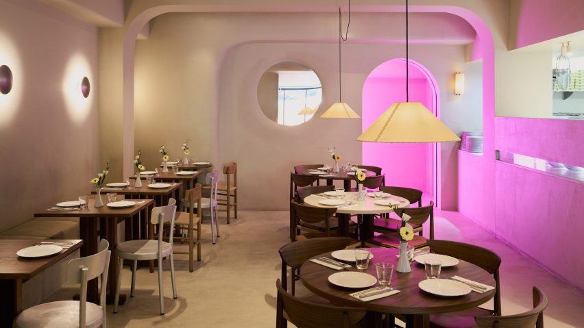 Pizza restaurant with pink-lit space
