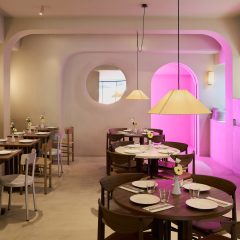 Pizza restaurant with pink-lit space