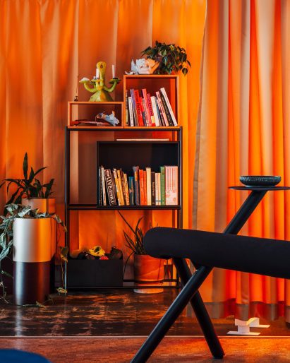 A curtain system by Carlos Medellin wraps a design studio