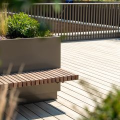 a rooftop terrace with seating