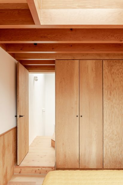 Bedroom interior at Tile House by YN Studio