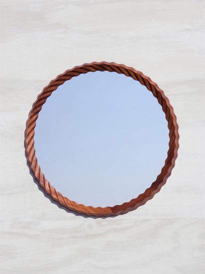 Mirror with wavy frame