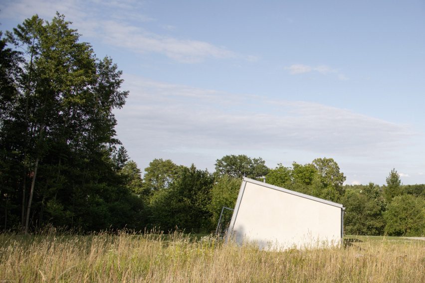 Modular home with sloping facade by Papundekl Architects