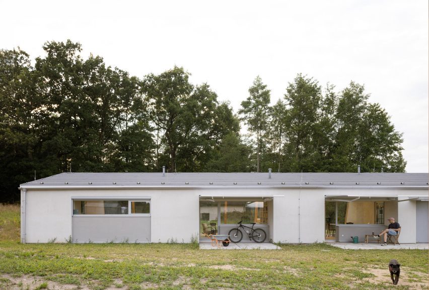 Modular home with sloping facade by Papundekl Architects