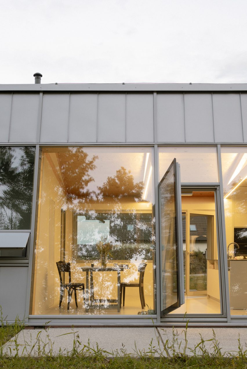 Modular home with sloping facade by Papundekl Architects