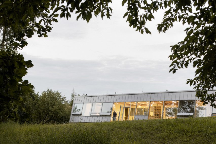Modular home with sloping facade by Papundekl Architects