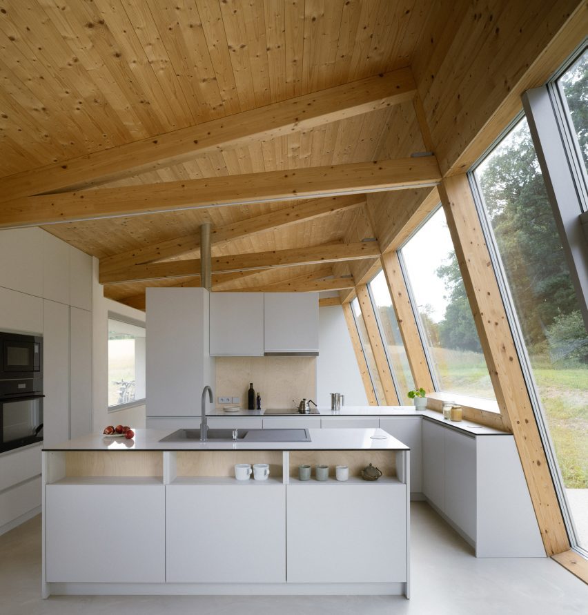 Modular home with sloping facade by Papundekl Architects