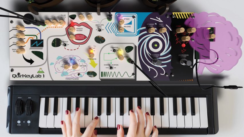 Hands playing keyboard with various attachments
