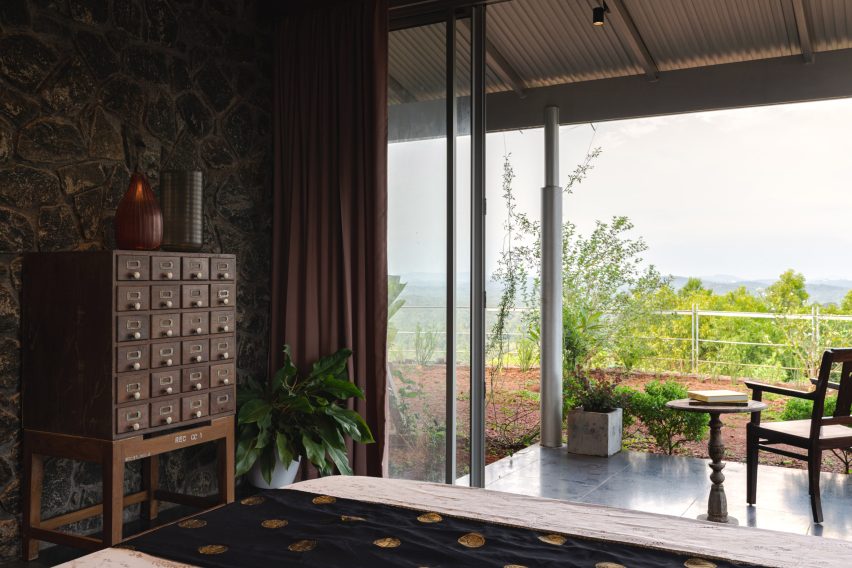 Bedroom interior of Ushas farmhouse overlooking mountain views
