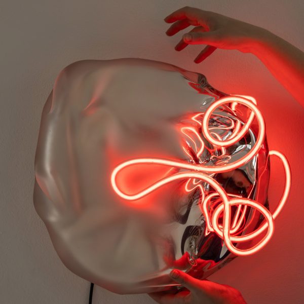 Photo of neon and glass light