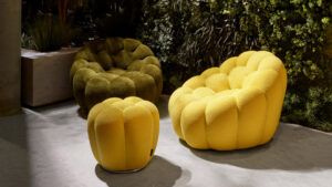 Photo of yellow and green chairs and foot rest