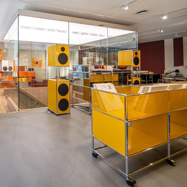 Photo of yellow record furniture by USM