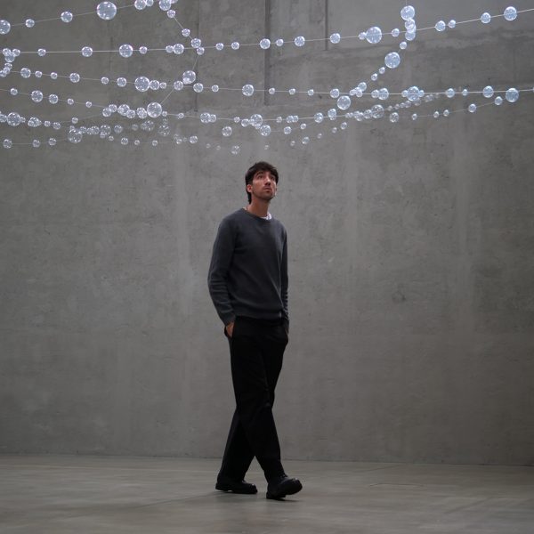 Student looking at a light display