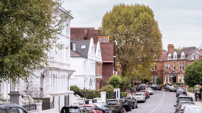 Narrow brick townhouse between Victorian villas in Hampstead