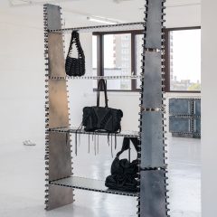 Shelf with rivets