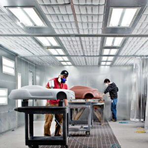 Photo of people in auto workshop