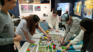 Photo of students in work room