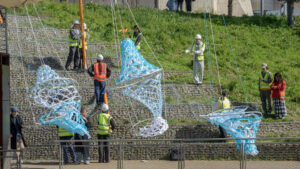Photo of people installing an installation