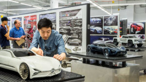 Photo of people in auto workshop