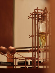 Fragrance sculpture made from glass and copper