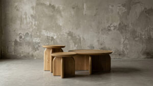 Two wooden tables in concrete-walled space