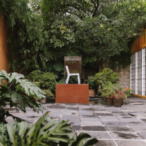 Recycled-plastic plinths hold furniture at “secret” Barragán house in Mexico City