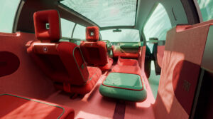Interior of the Fiat Multiplay concept showing red seats, a pink floor and a panoramic glass roof
