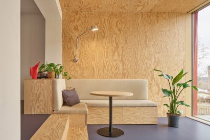 built-in storage is concealed within the custom furniture
