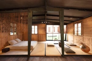 Bed and tatami mats inside wooden house