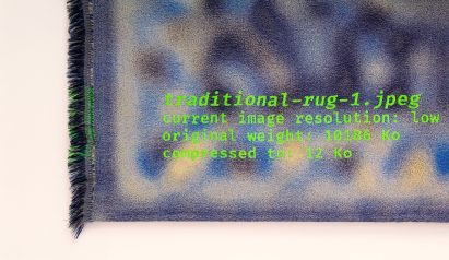 Blurry Persian-style rug hung on white wall