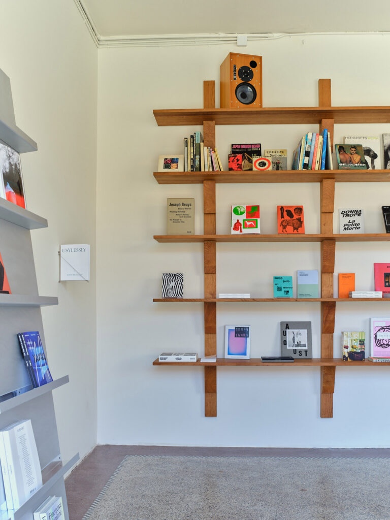Cherry wood shelves by Derya Arpaç in Simone Book Services