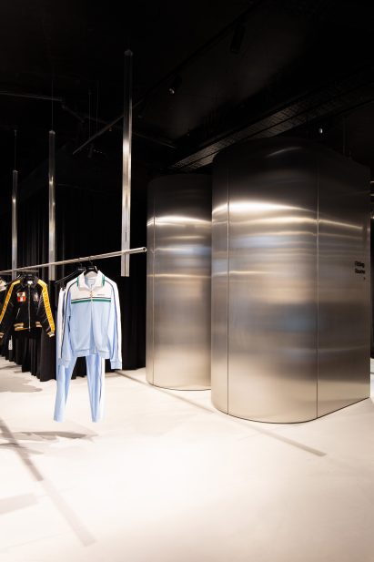 Curved steel fitting rooms