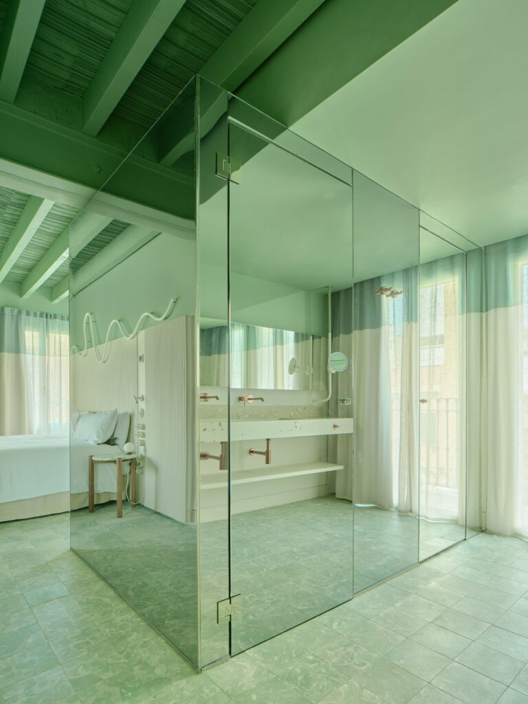 Green bathroom in Terreno Barrio Hotel in Palma by OHLAB
