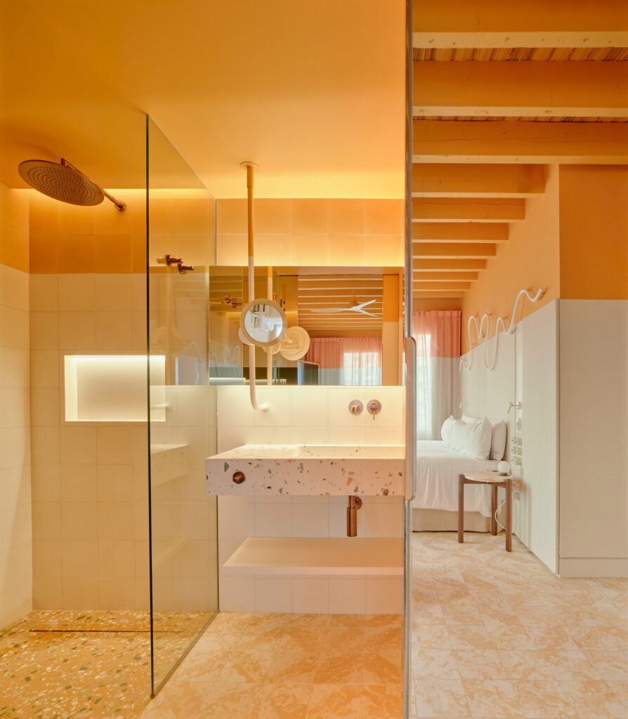 Orange room in Terreno Barrio Hotel in Palma by OHLAB