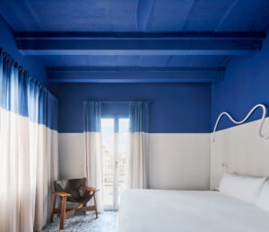 Blue bedroom in Terreno Barrio Hotel in Palma by OHLAB