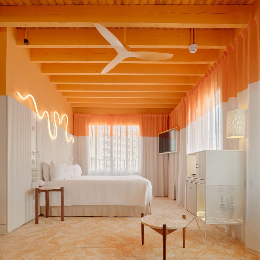 OHLAB experiments with colour-blocking and cork in old and new buildings of Terreno Barrio Hotel in Mallorca