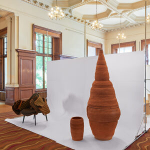Furniture on a white backdrop in an exhibition